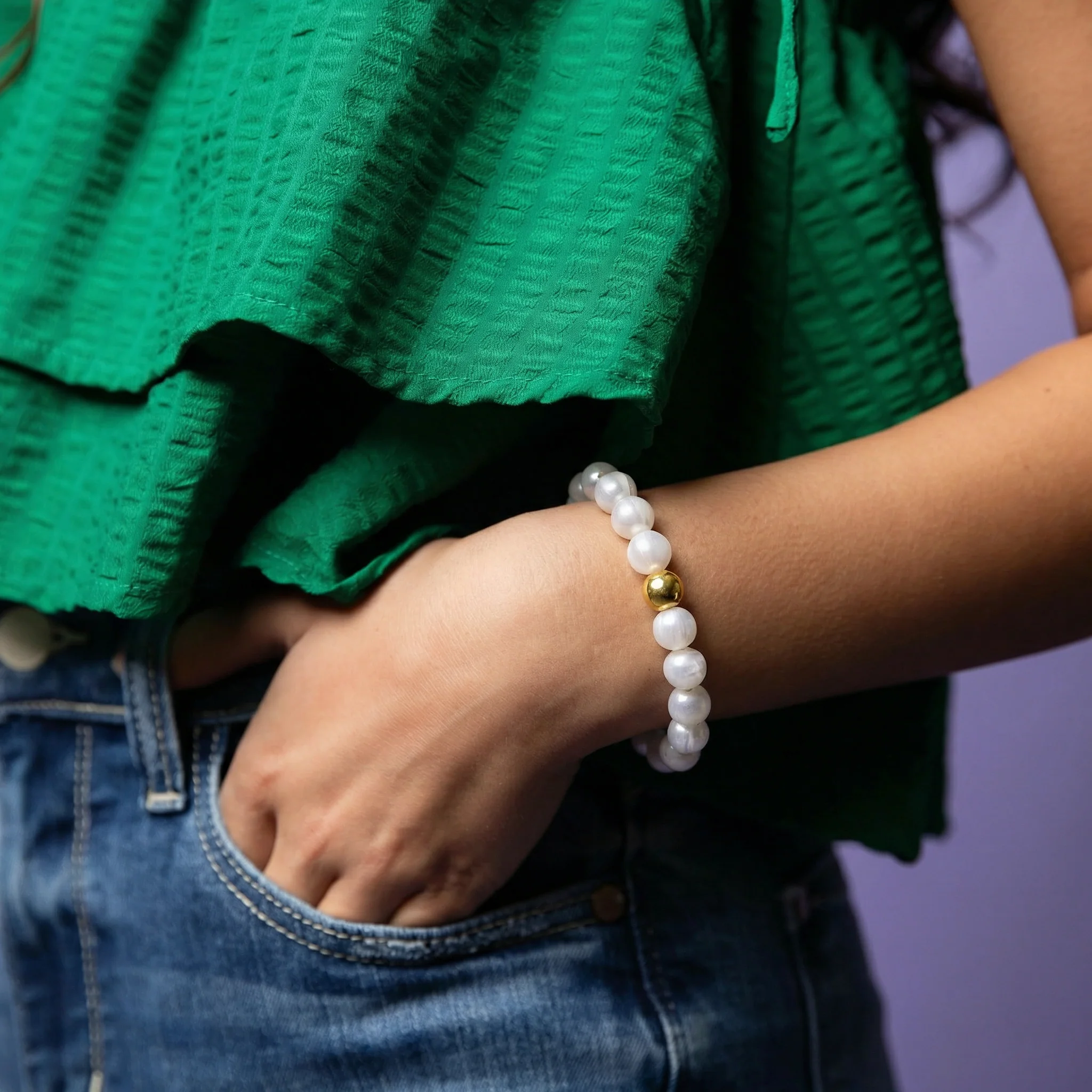 18k Gold Plated Clear Tumbled Glass Beaded Stretch Bracelet with Gold Ball - Image 2