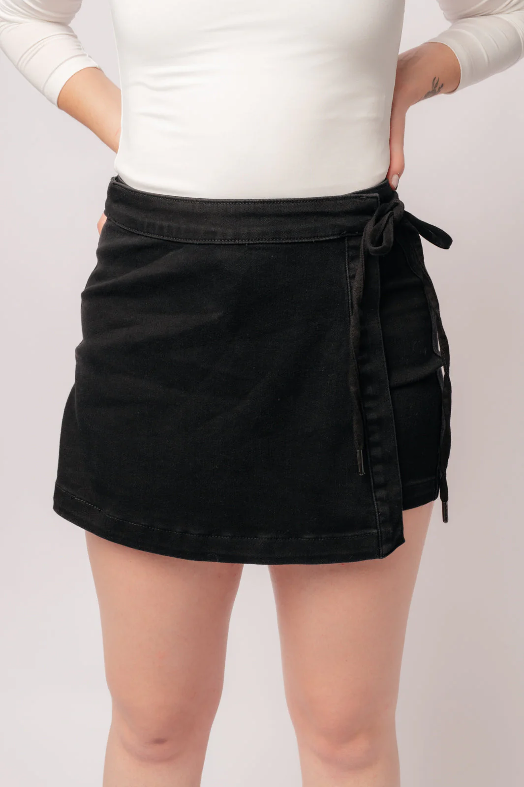 Bentli High Rise Side Tie Denim Skort in Black - Image 18
