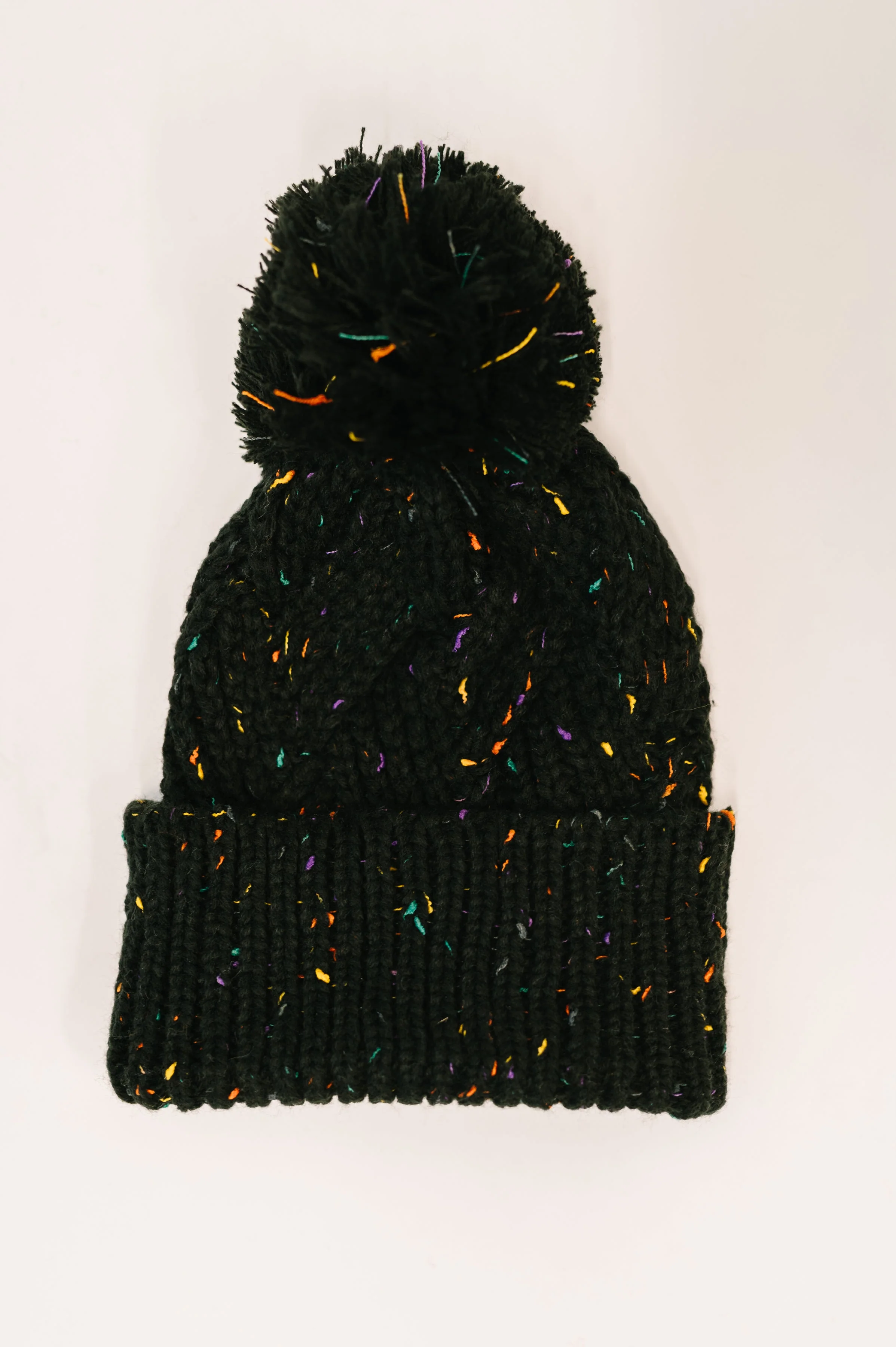 Cover Your Ears Pom Pom Beanie in Black - Image 2