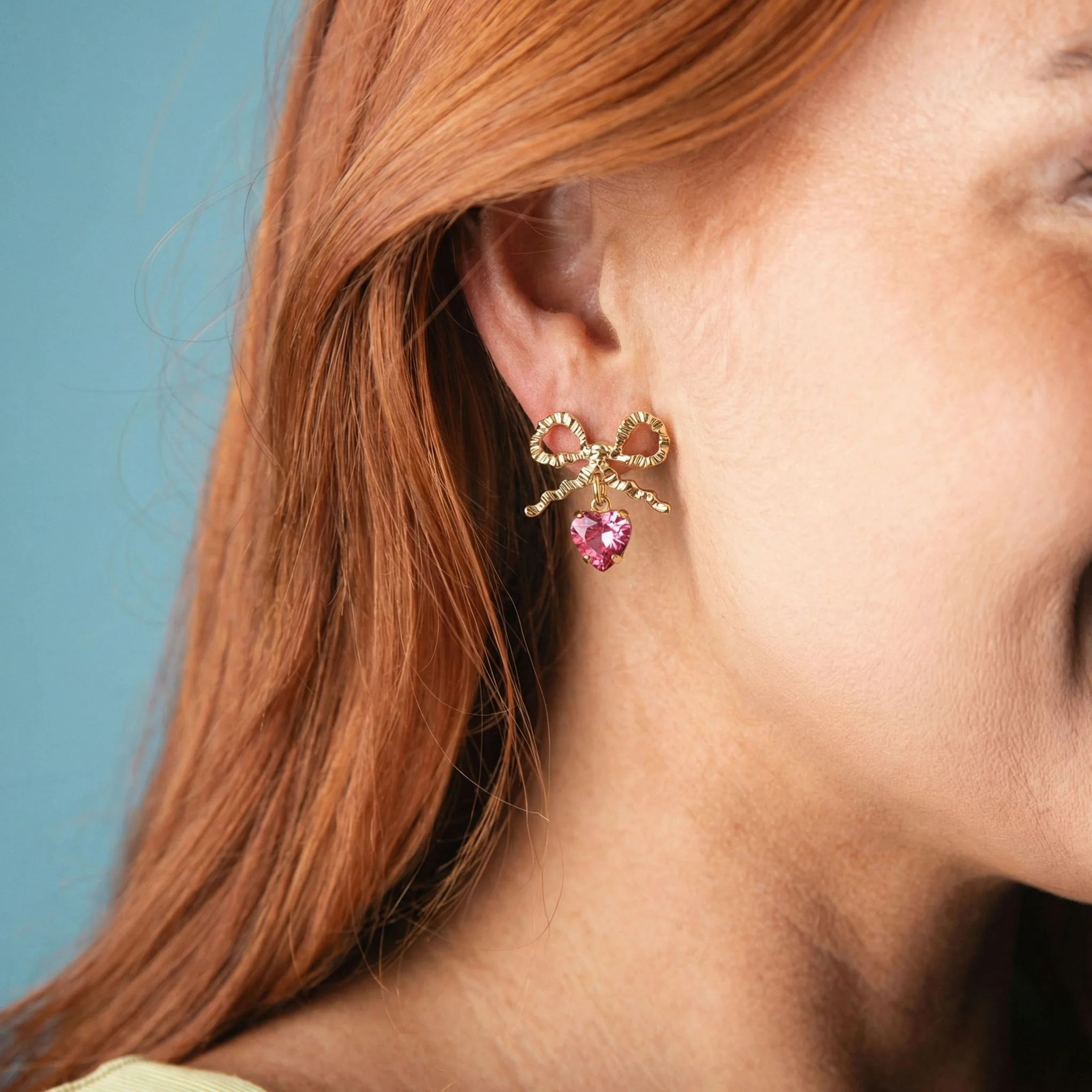 Gold Bow Earring with Pink Crystal Heart - Image 2